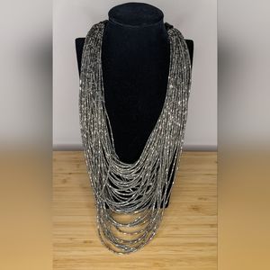 Long silver beaded necklace